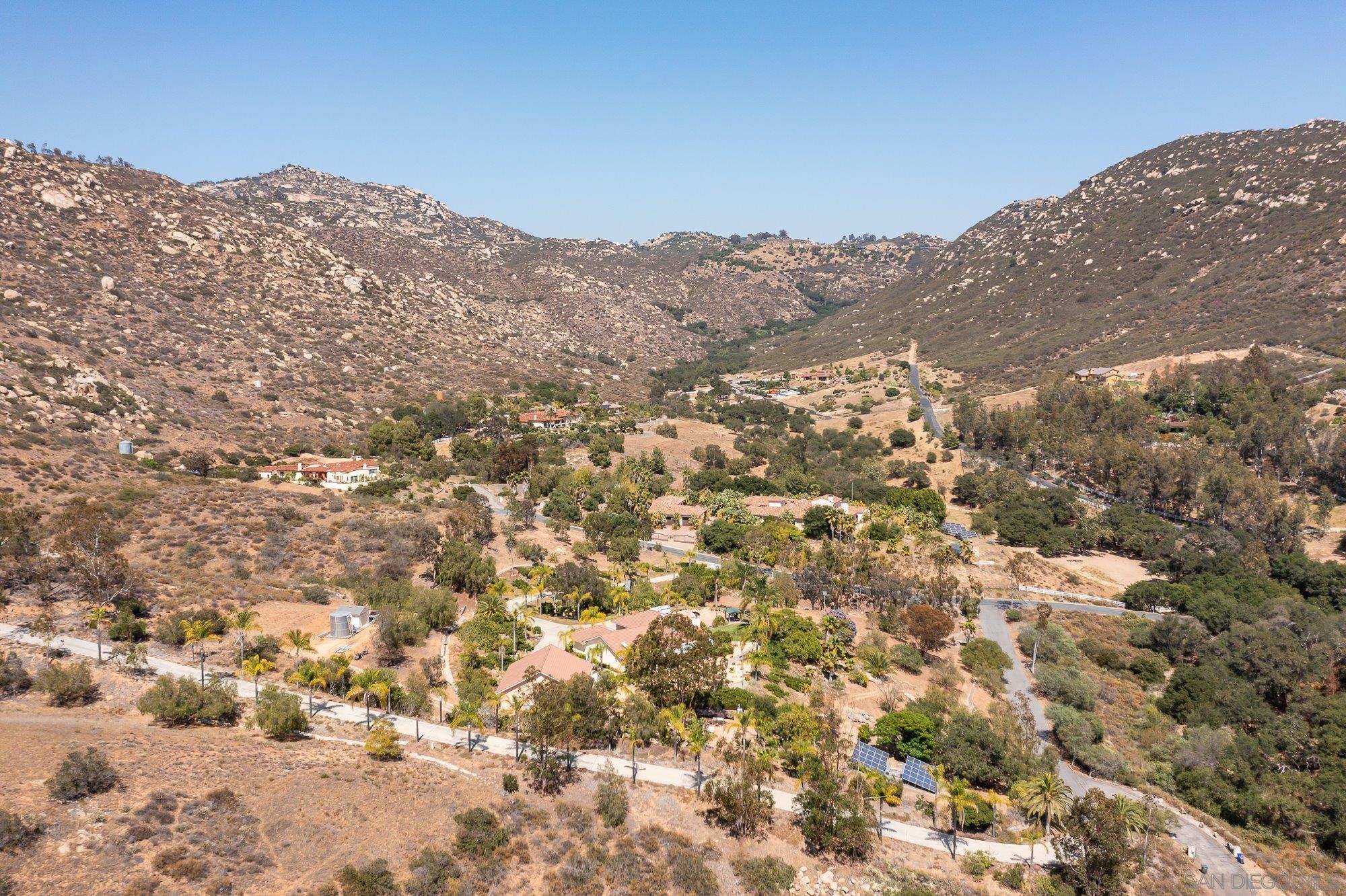 14860 Sunset Ridge Court Poway, CA 92064 - Photo 17 of 27 an aerial view of mountain with yard