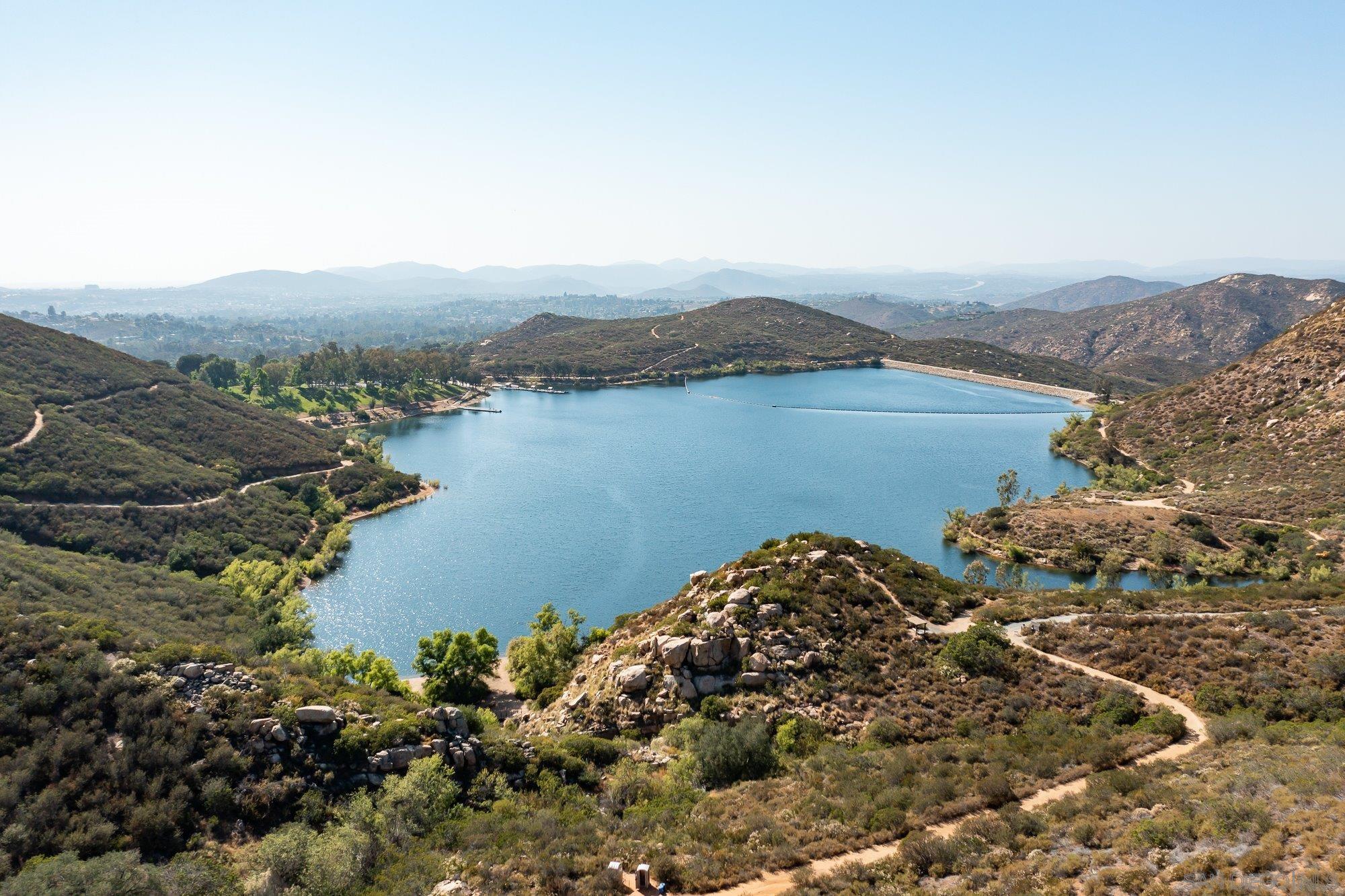 14860 Sunset Ridge Court Poway, CA 92064 - Photo 23 of 27 a view of a lake with a mountain in the background