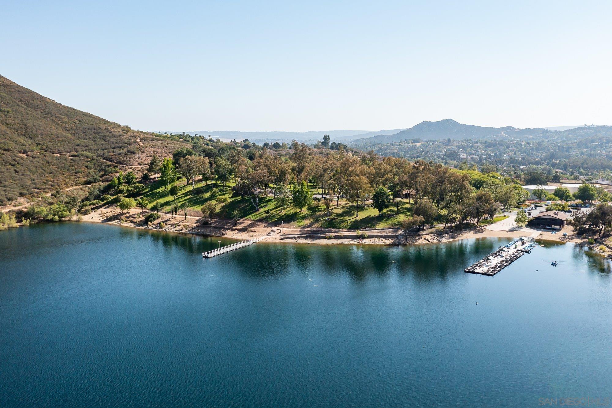 14860 Sunset Ridge Court Poway, CA 92064 - Photo 24 of 27 an aerial view of residential houses with outdoor space and lake view