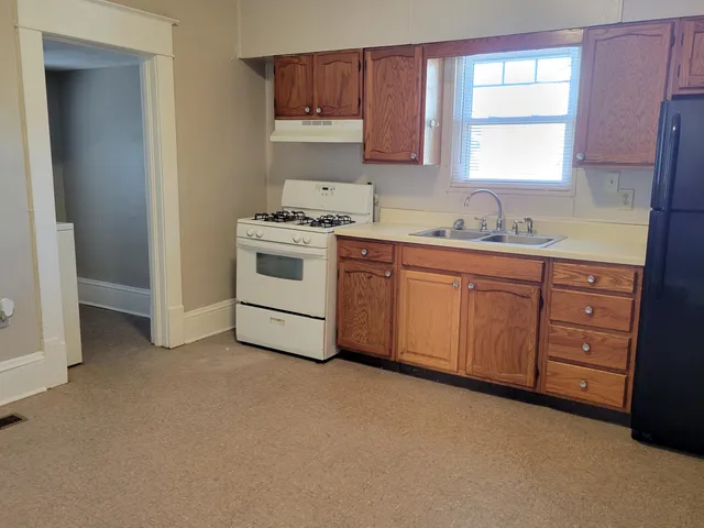 a view of a room with rack on the wall