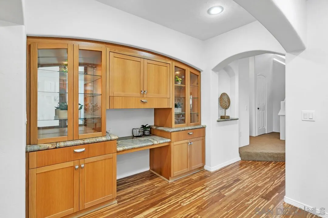 13419 Sebago Avenue Poway, CA 92064 - Photo 24 of 49 a kitchen with stainless steel appliances granite countertop a stove a sink and a refrigerator