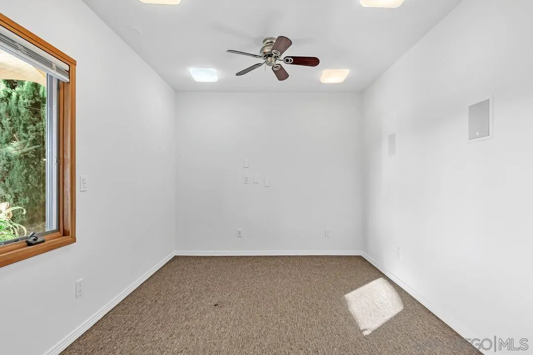13419 Sebago Avenue Poway, CA 92064 - Photo 25 of 49 an empty room with a window