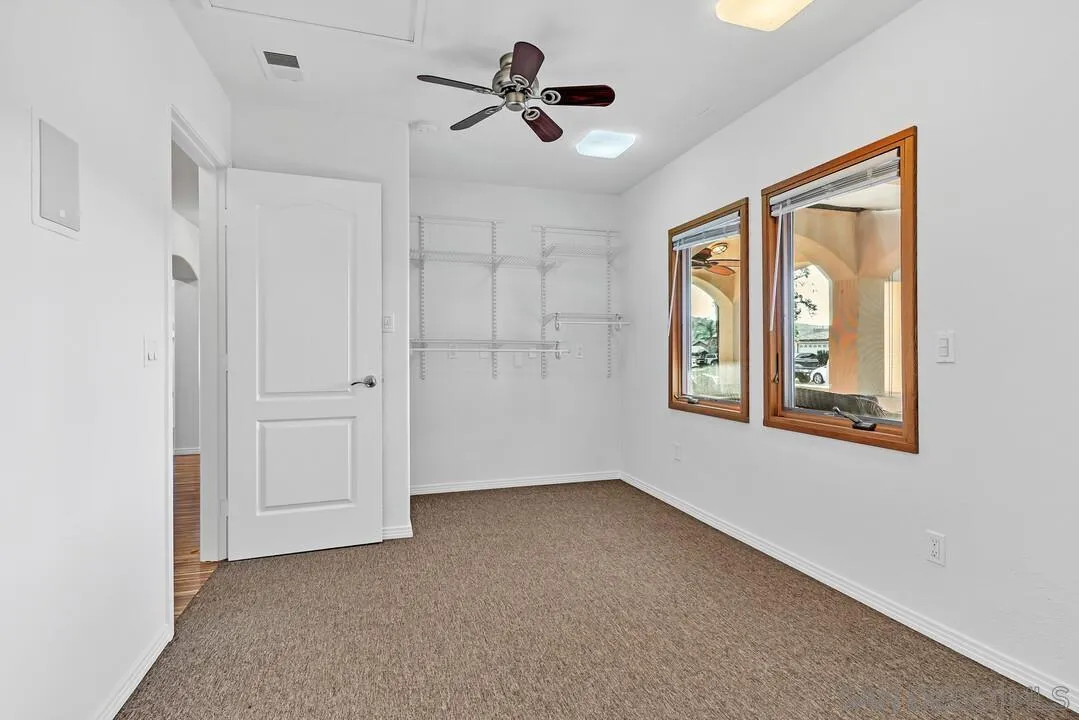 13419 Sebago Avenue Poway, CA 92064 - Photo 26 of 49 a view of an empty room with a window