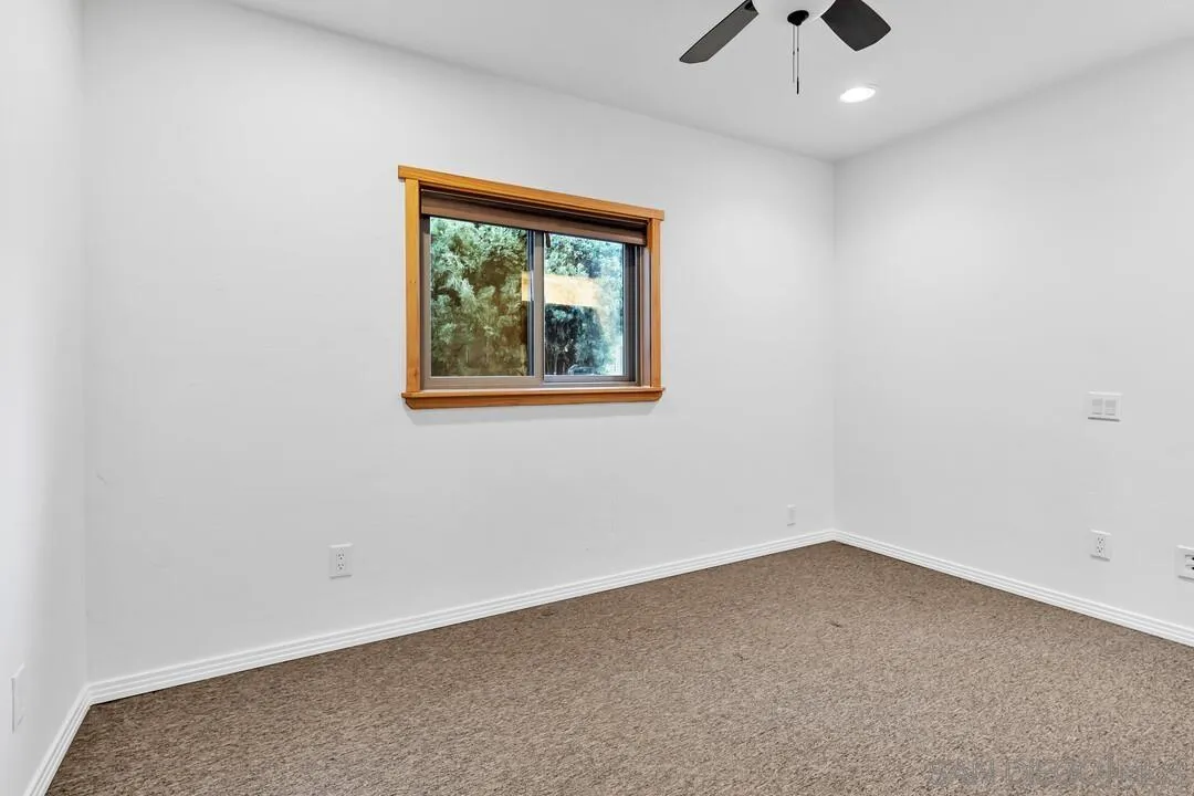 13419 Sebago Avenue Poway, CA 92064 - Photo 28 of 49 an empty room with a window