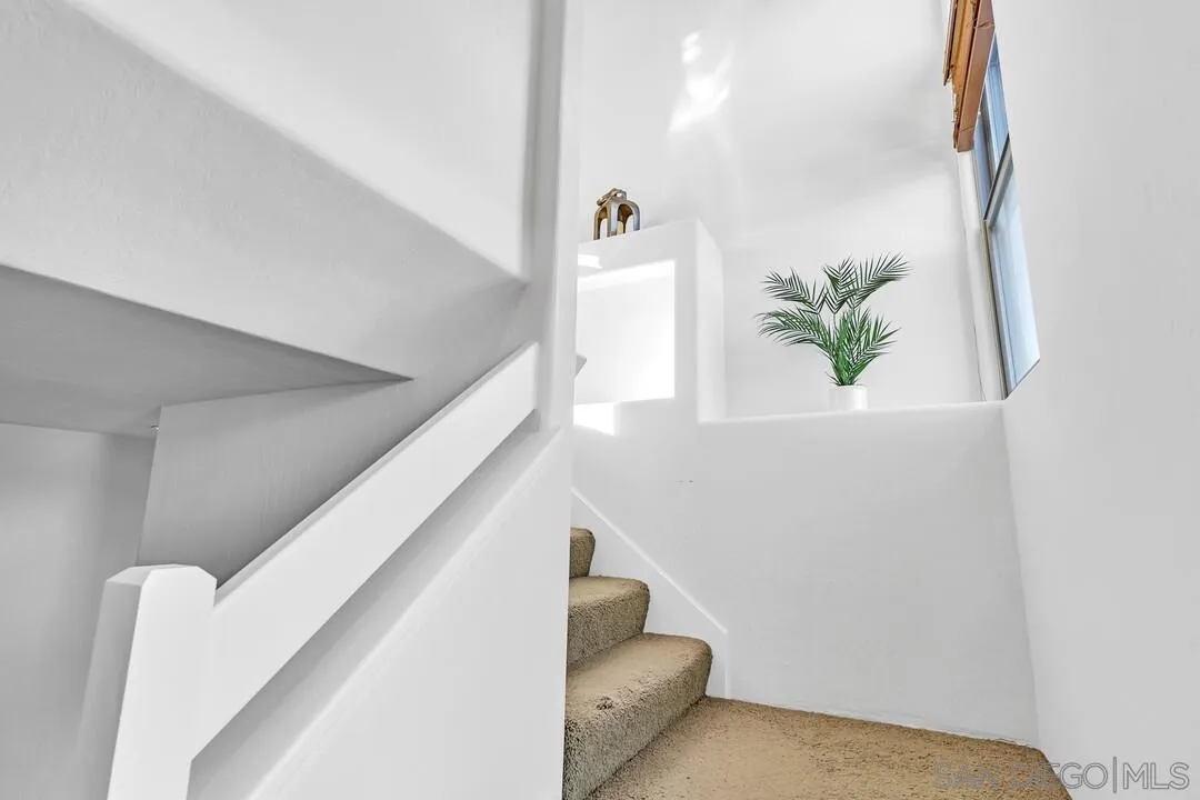 13419 Sebago Avenue Poway, CA 92064 - Photo 30 of 49 a living room with furniture and flowers