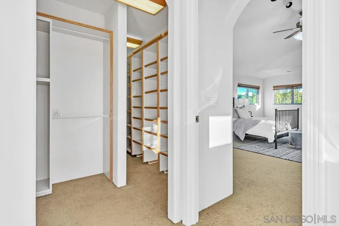 13419 Sebago Avenue Poway, CA 92064 - Photo 37 of 49 a view of livingroom with hardwood floor and a ceiling fan
