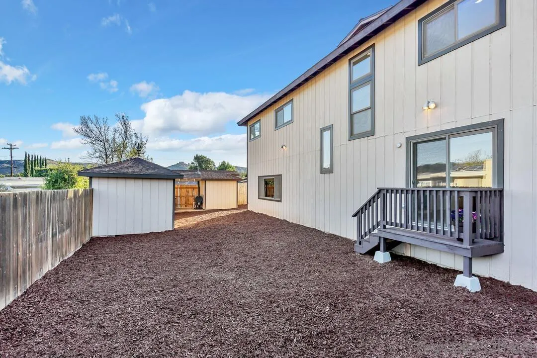 13419 Sebago Avenue Poway, CA 92064 - Photo 41 of 49 a view of a house with a yard and deck