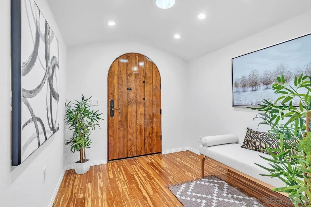 13419 Sebago Avenue Poway, CA 92064 - Photo 7 of 49 a living room with furniture and a potted plant