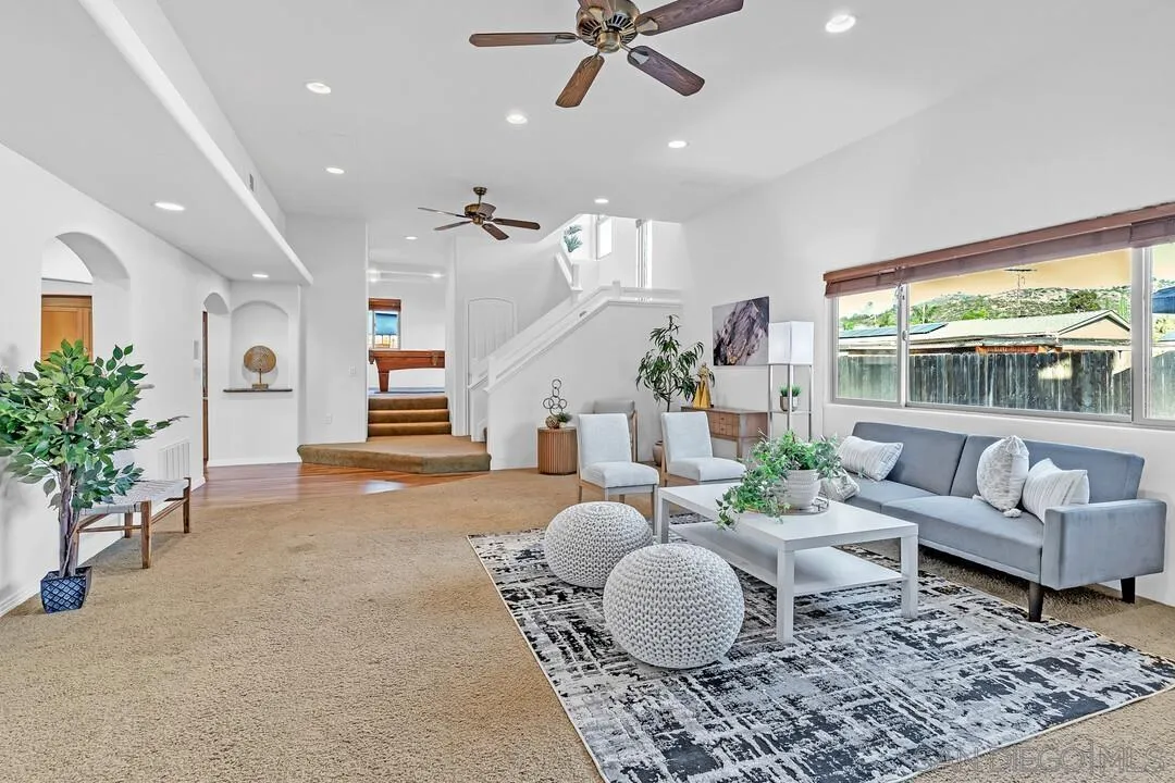 13419 Sebago Avenue Poway, CA 92064 - Photo 10 of 49 a living room with furniture and a large window
