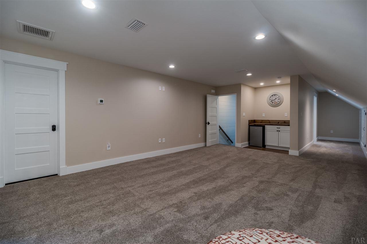 2365 Pine Level Church Road Jay, FL 32565 - Photo 18 of 48 Upstairs living/movie theater movie with wet bar