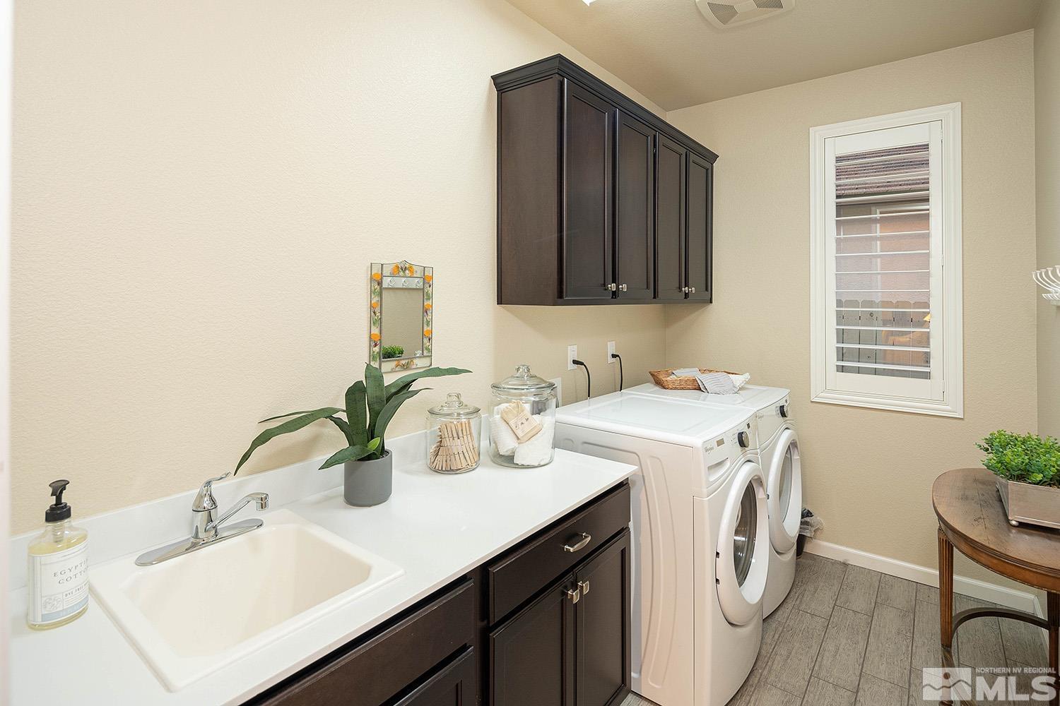 2185 Arpagos Lane Reno, NV 89521 - Photo 29 of 39 a utility room with dryer and washer