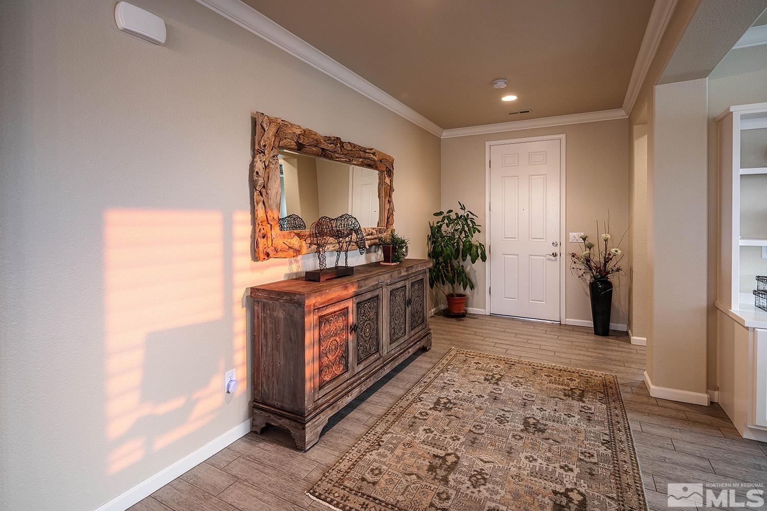 2185 Arpagos Lane Reno, NV 89521 - Photo 4 of 39 a view of living room with furniture and wooden floor