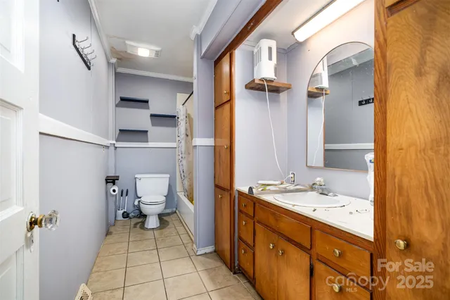 a bathroom with a sink and mirror