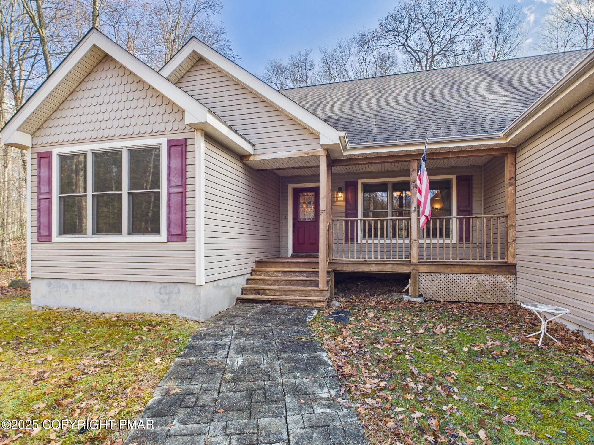 1286 Blackberry Road Pocono Lake, PA 18347 - Photo 3 of 52 CAM03442G0-PR0185-STILL010