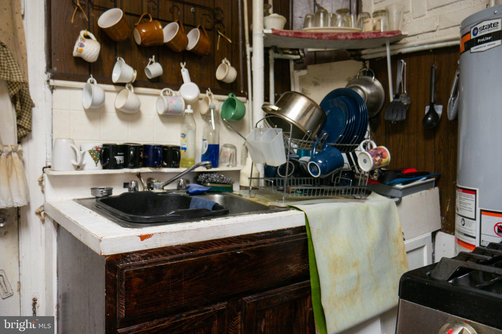 2232 Chester Street Southeast Washington, DC 20020 - Photo 12 of 35 Charming kitchen with rustic appeal.