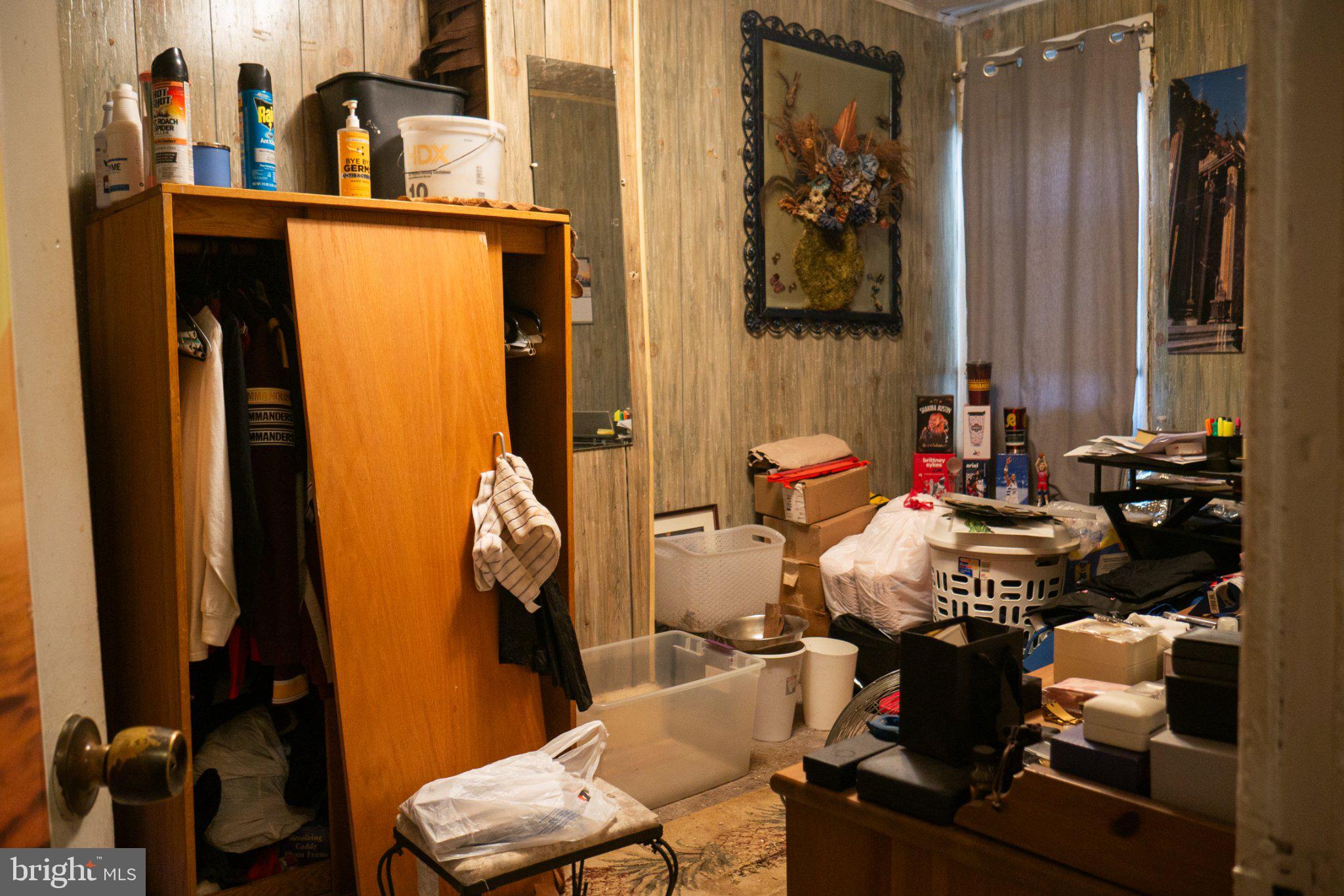2232 Chester Street Southeast Washington, DC 20020 - Photo 19 of 35 Cluttered space with potential charm.