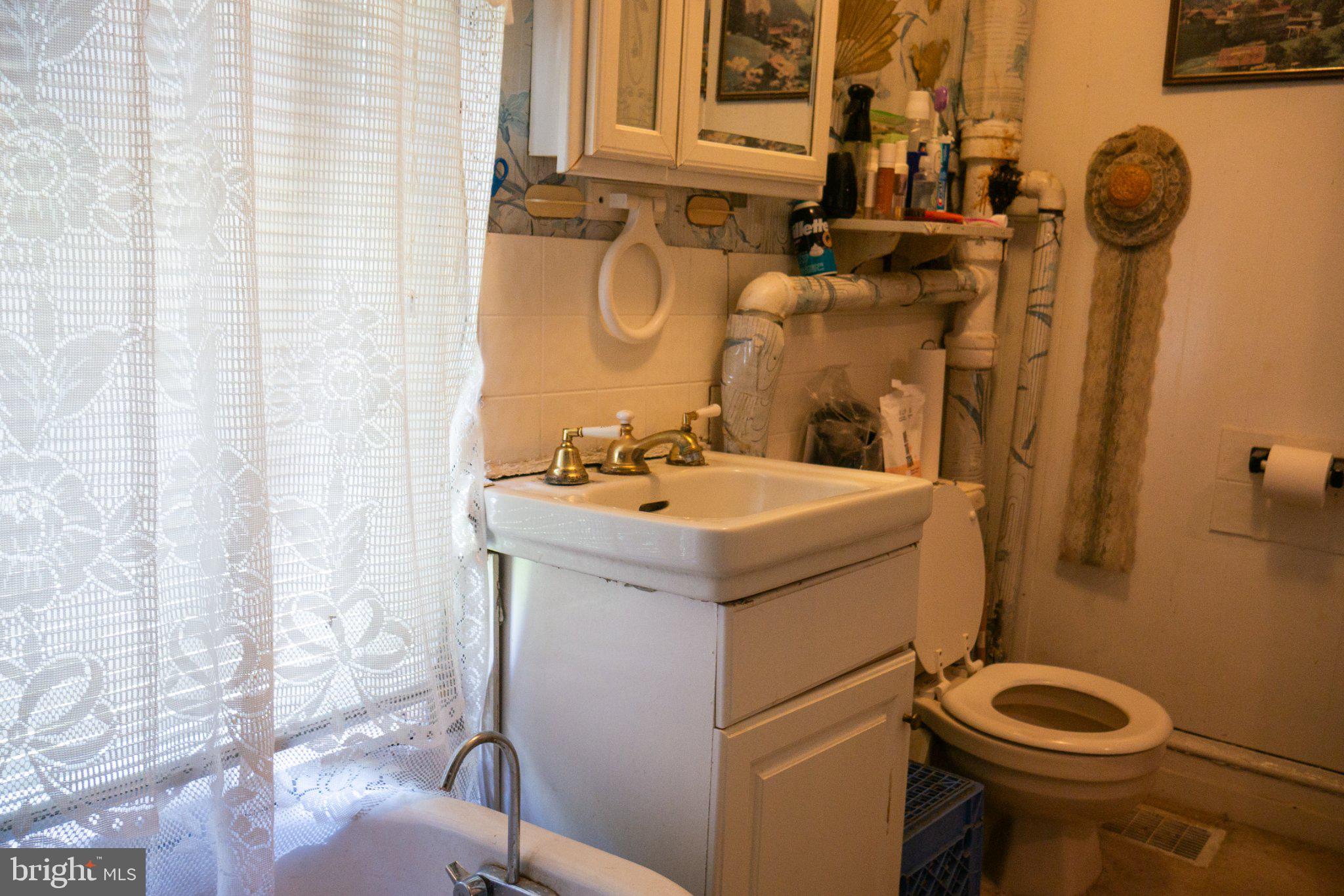 2232 Chester Street Southeast Washington, DC 20020 - Photo 23 of 35 Charming vintage bathroom retreat.