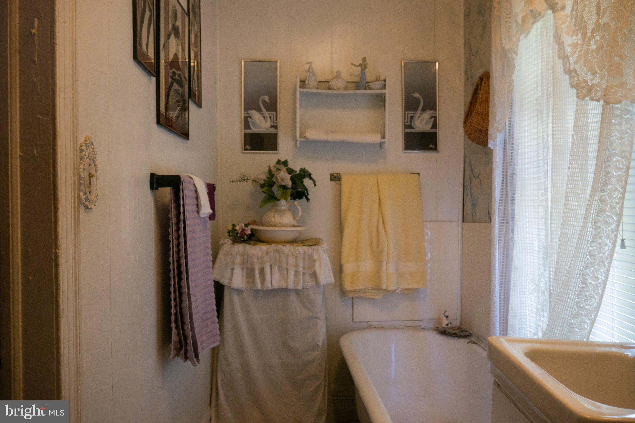 2232 Chester Street Southeast Washington, DC 20020 - Photo 25 of 35 Charming vintage bathroom retreat.