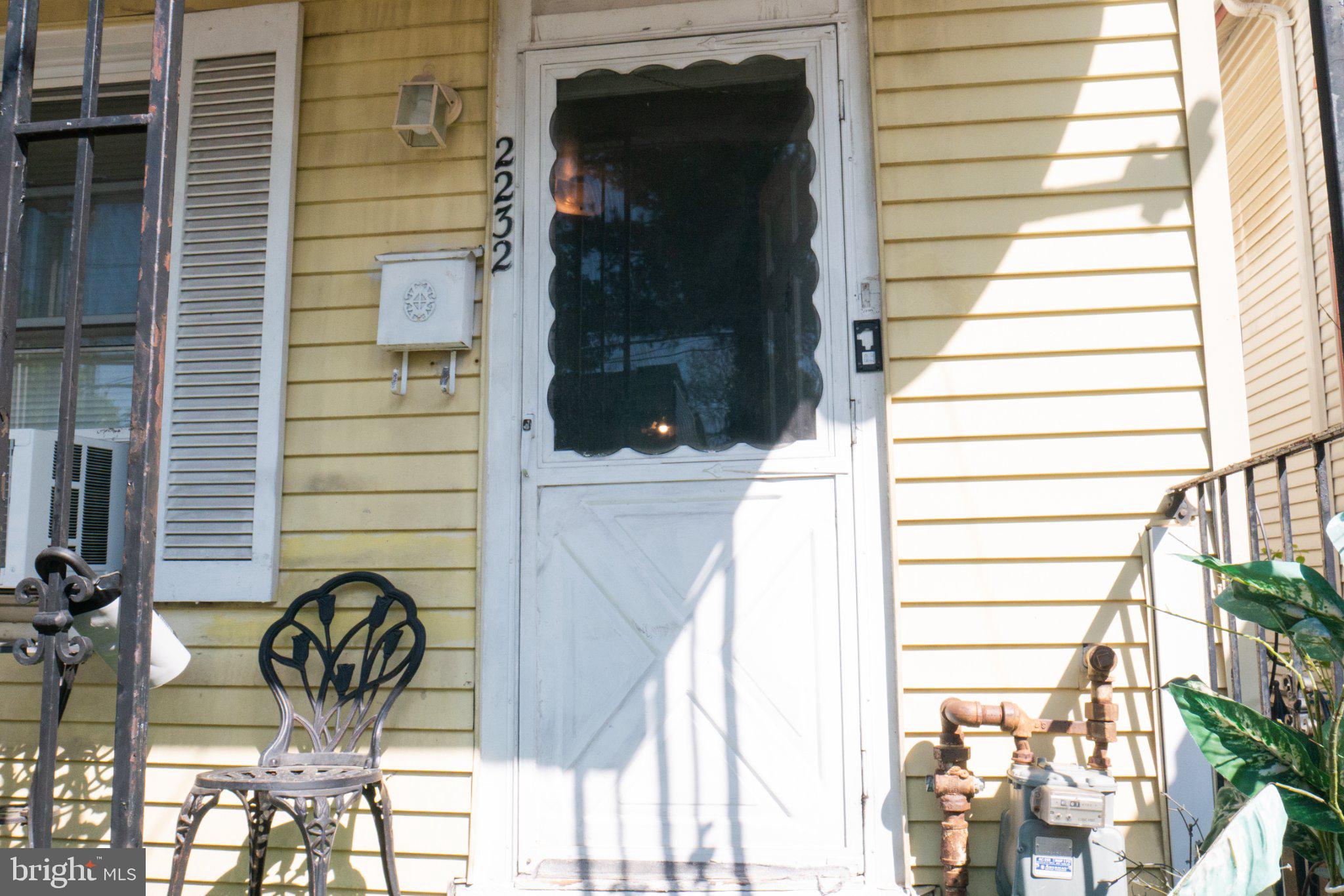 2232 Chester Street Southeast Washington, DC 20020 - Photo 30 of 35 Charming yellow entrance with character.