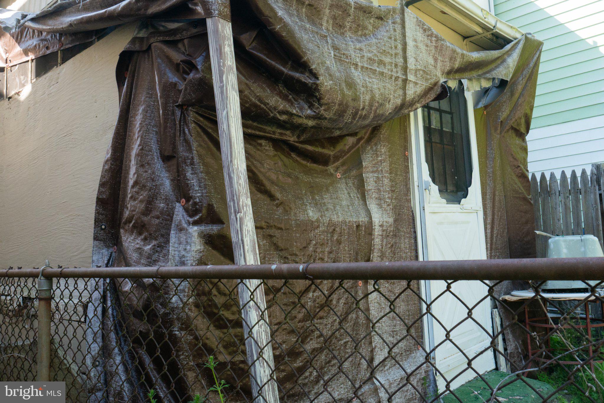 2232 Chester Street Southeast Washington, DC 20020 - Photo 35 of 35 Weathered exterior with a rustic charm.