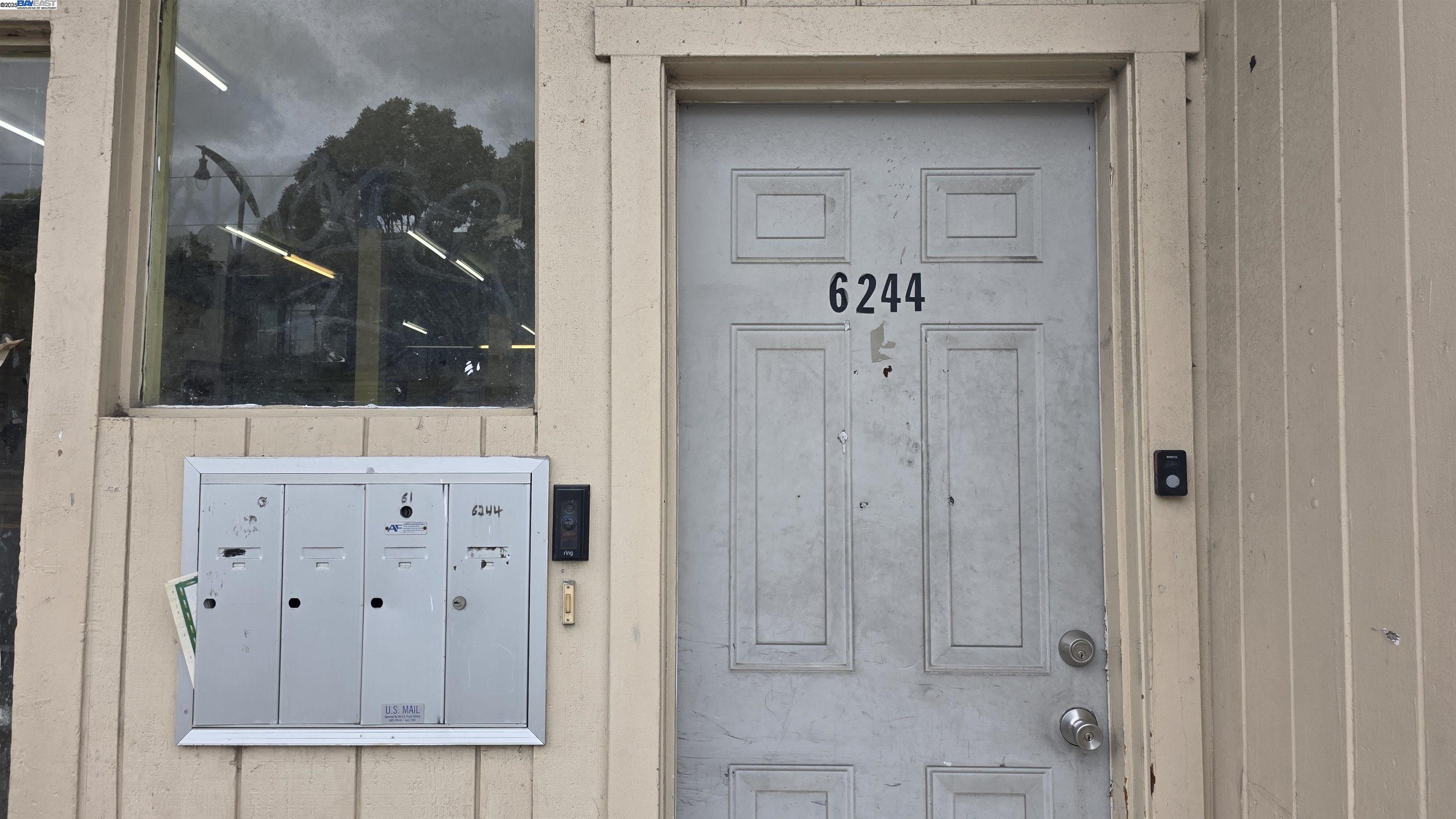 6246 3rd Street San Francisco, CA 94124 - Photo 4 of 8 a view of a hallway with wooden floor