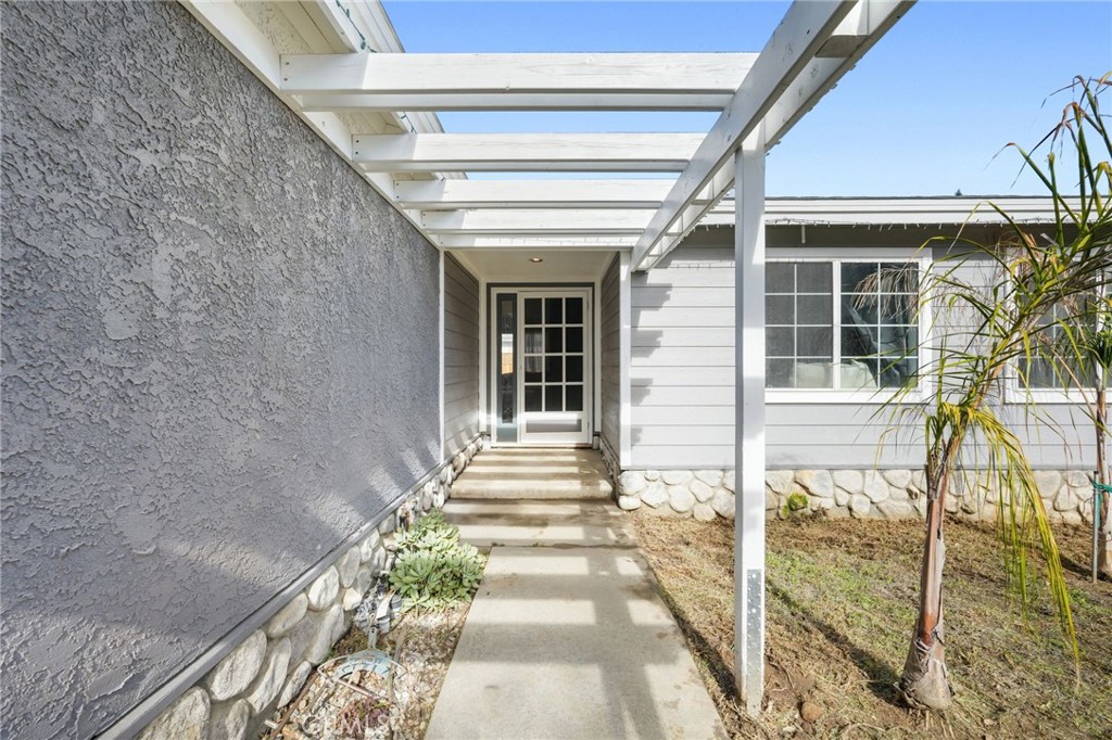 30257 Trellis Road Val Verde, CA 91384 - Photo 4 of 20 a front view of a house with a porch