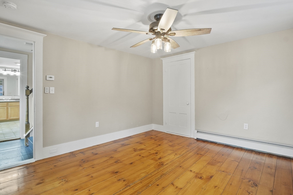 4 Winter Street, Unit 4 Amesbury, MA 01913 - Photo 19 of 39 a view of a room with a ceiling fan