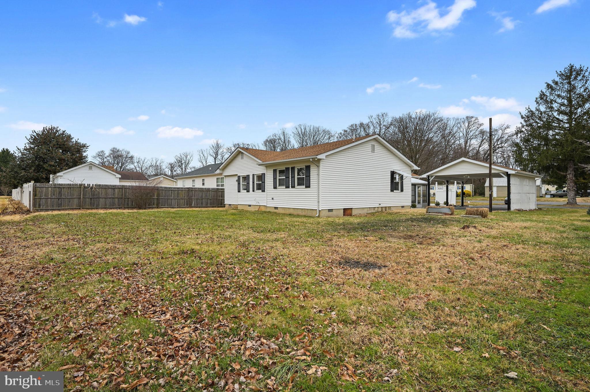 2891 Kenton Road Dover, DE 19904 - Photo 2 of 18 a house view with a garden space