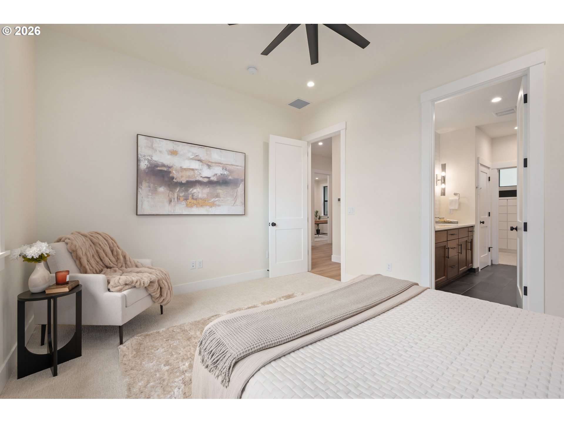 4835 Elva Lane Eugene, OR 97405 - Photo 20 of 48 a bedroom with a bed and a chandelier