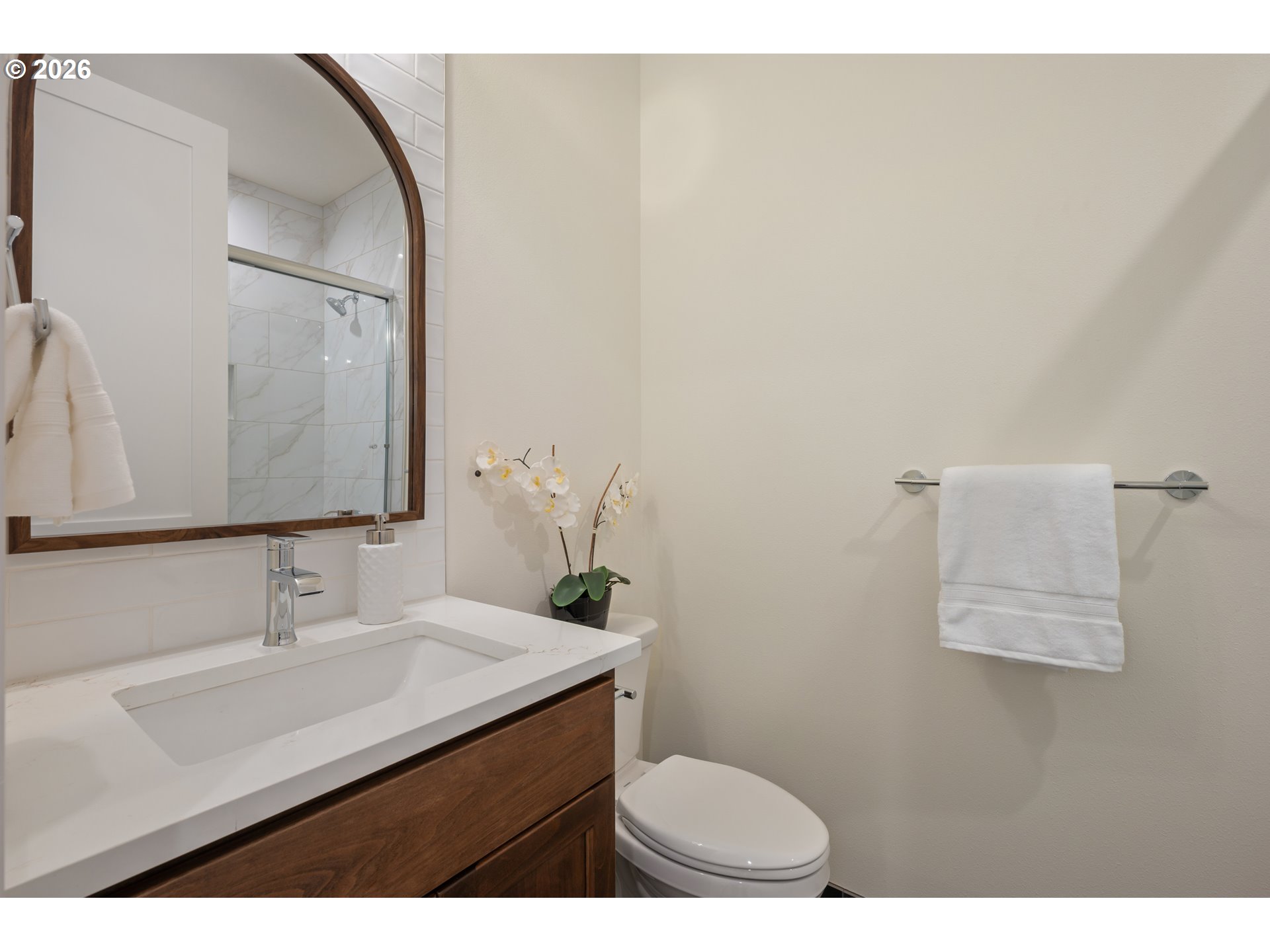 4835 Elva Lane Eugene, OR 97405 - Photo 27 of 48 a bathroom with a sink toilet a mirror and vanity