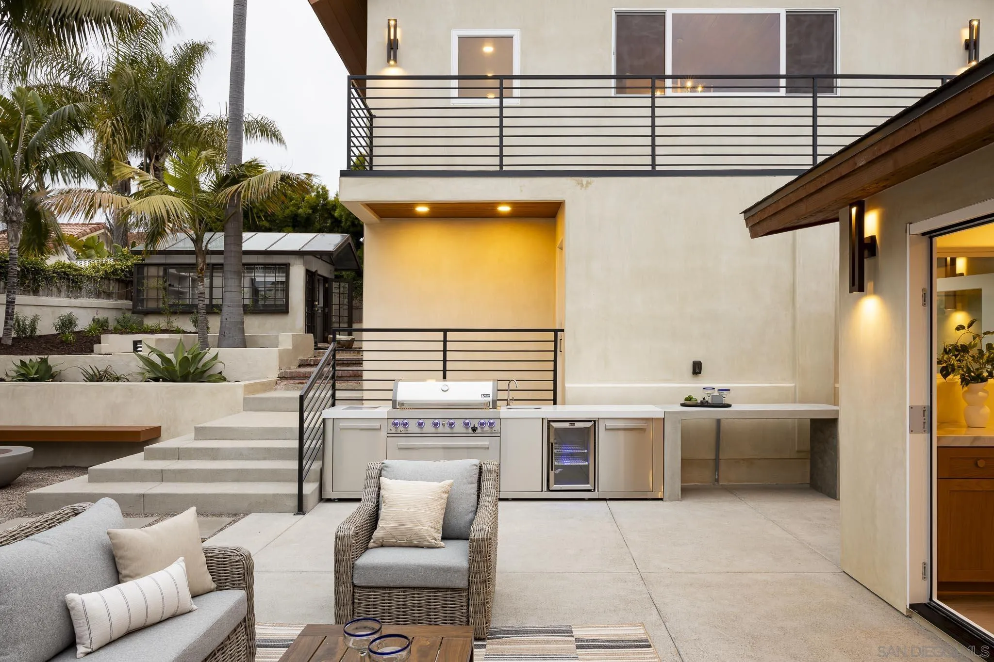 614 Ezee Street Encinitas, CA 92024 - Photo 23 of 46 a view of a patio with couches and potted plants