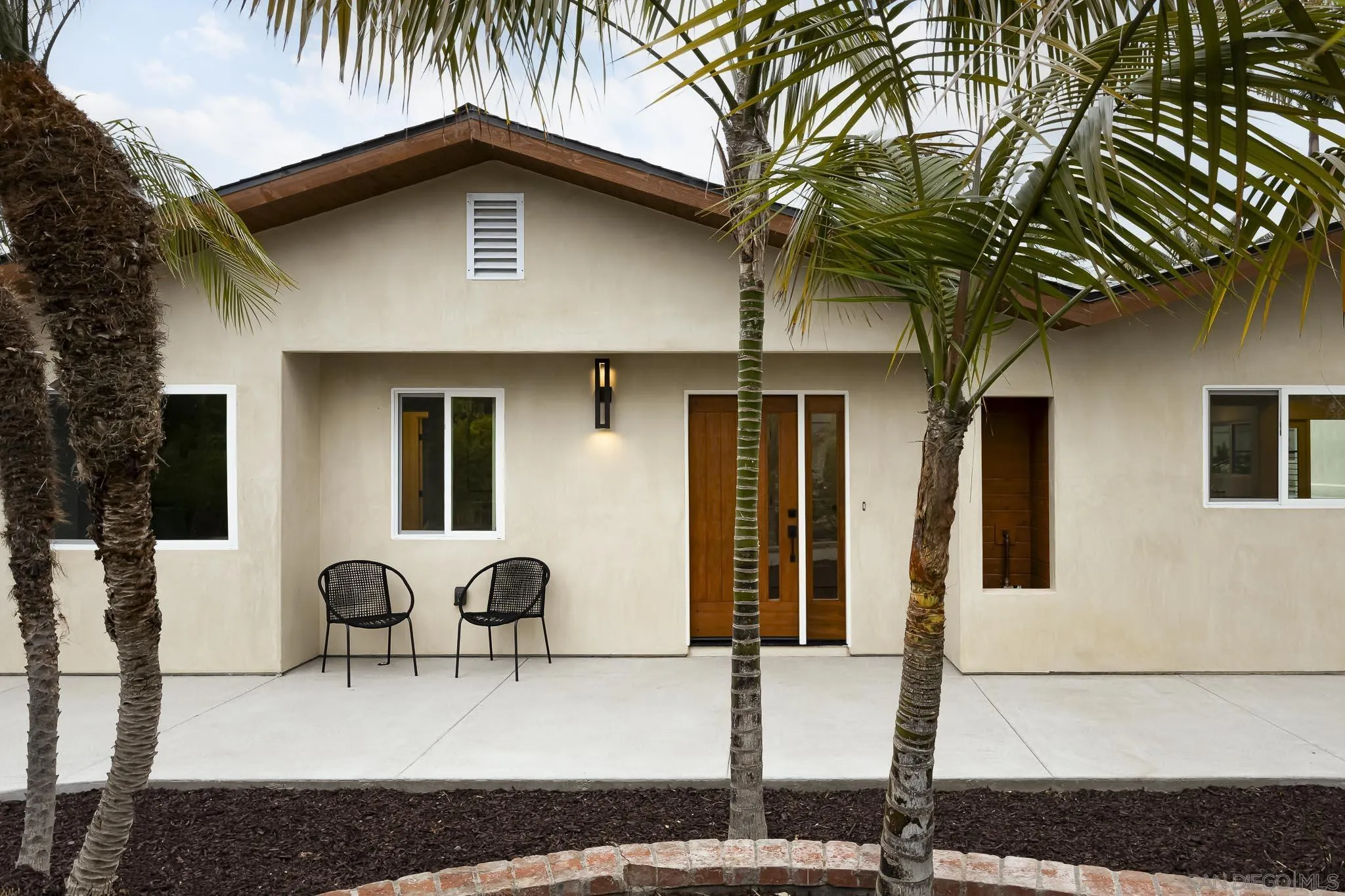 614 Ezee Street Encinitas, CA 92024 - Photo 24 of 46 a front view of a house with garden