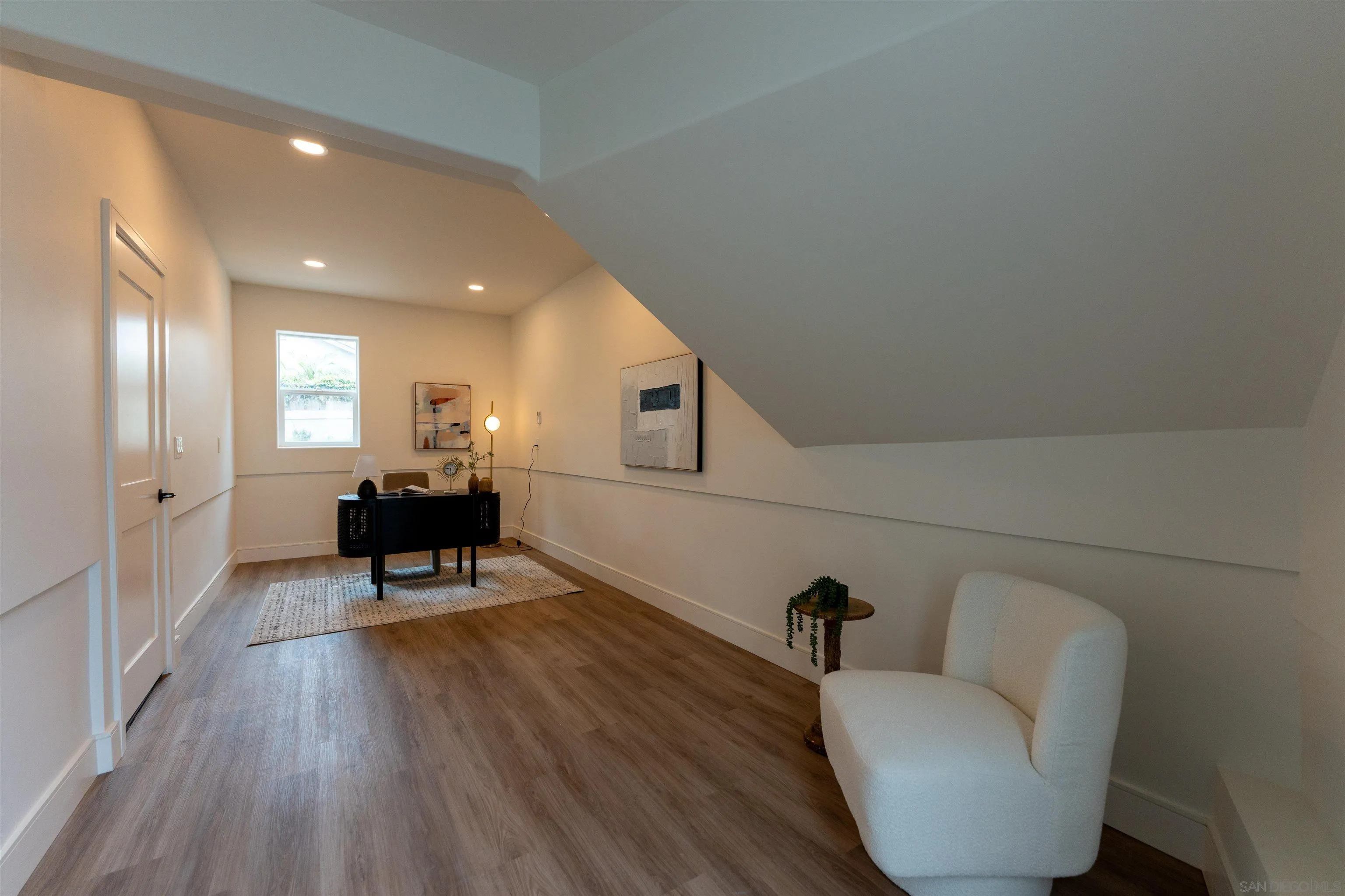 614 Ezee Street Encinitas, CA 92024 - Photo 37 of 46 a living room with furniture and a wooden floor