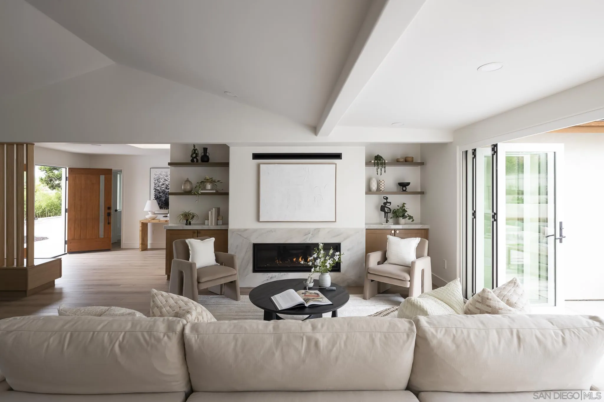 614 Ezee Street Encinitas, CA 92024 - Photo 4 of 46 a living room with furniture and a fireplace