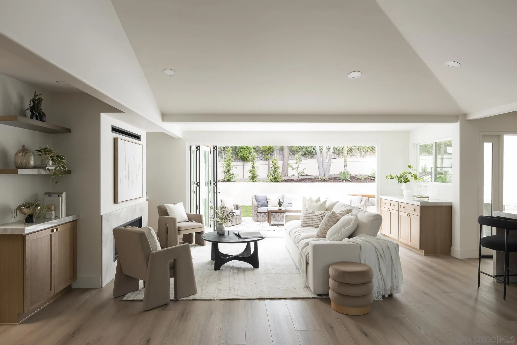 614 Ezee Street Encinitas, CA 92024 - Photo 6 of 46 a living room with furniture and a large window