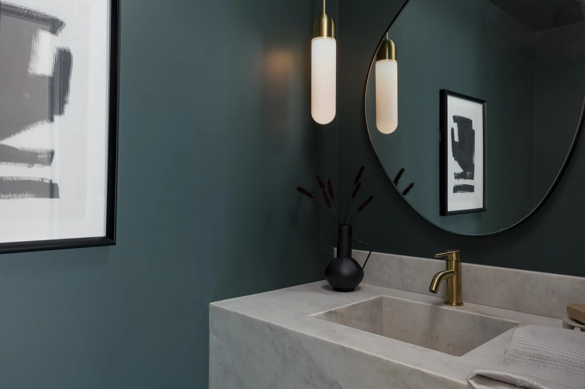 614 Ezee Street Encinitas, CA 92024 - Photo 9 of 46 a bathroom with a sink and mirror