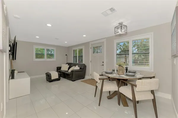 a living room with furniture and a window