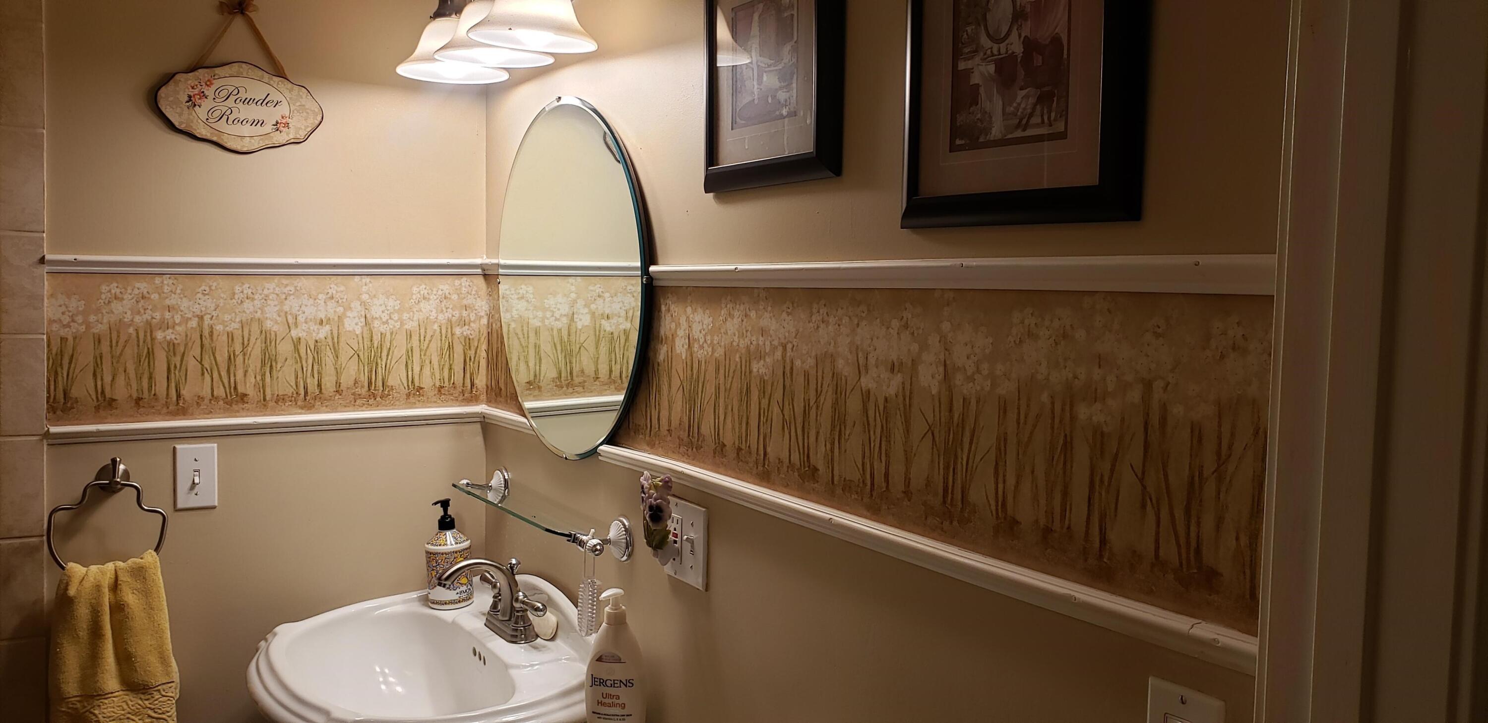 24924 Curve Street Fall River Mills, CA 96028 - Photo 19 of 25 a bathroom with a sink and a mirror