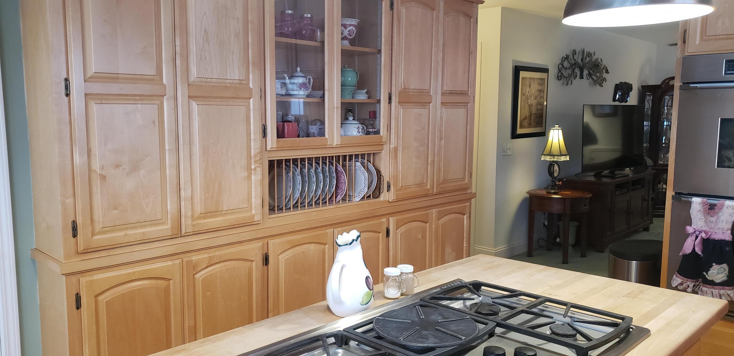 24924 Curve Street Fall River Mills, CA 96028 - Photo 20 of 25 a kitchen with stainless steel appliances granite countertop a sink stove and cabinets