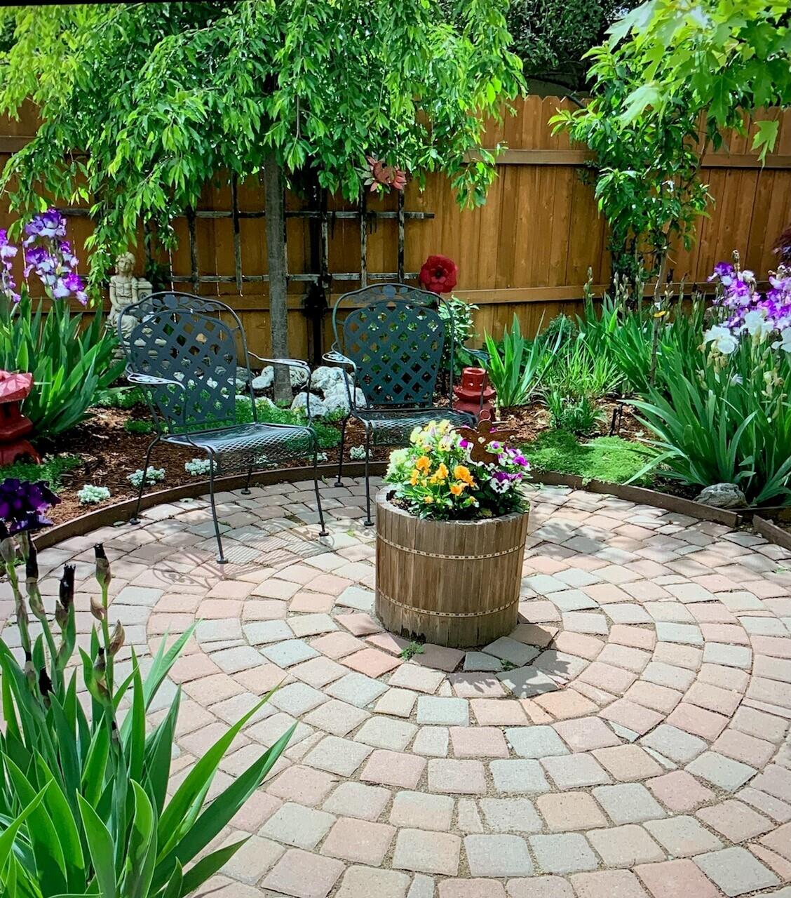 24924 Curve Street Fall River Mills, CA 96028 - Photo 23 of 25 a view of a garden with flowers and trees