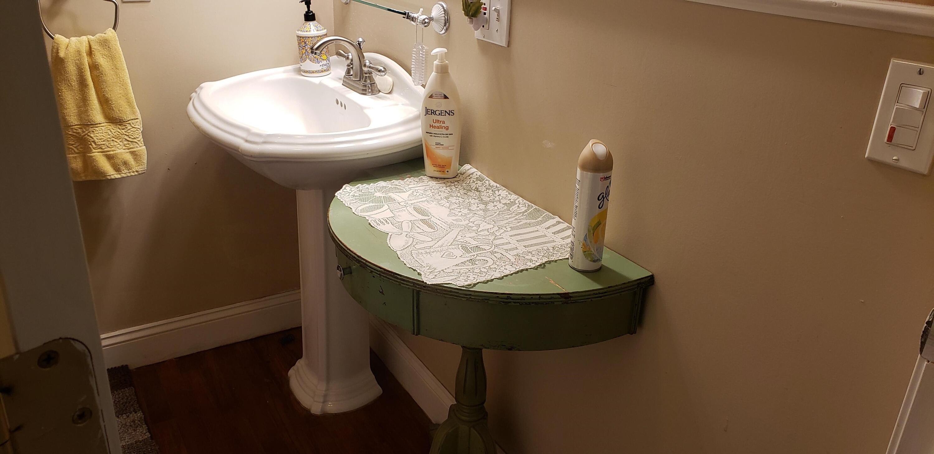 24924 Curve Street Fall River Mills, CA 96028 - Photo 4 of 25 a bathroom with a sink toilet and a mirror