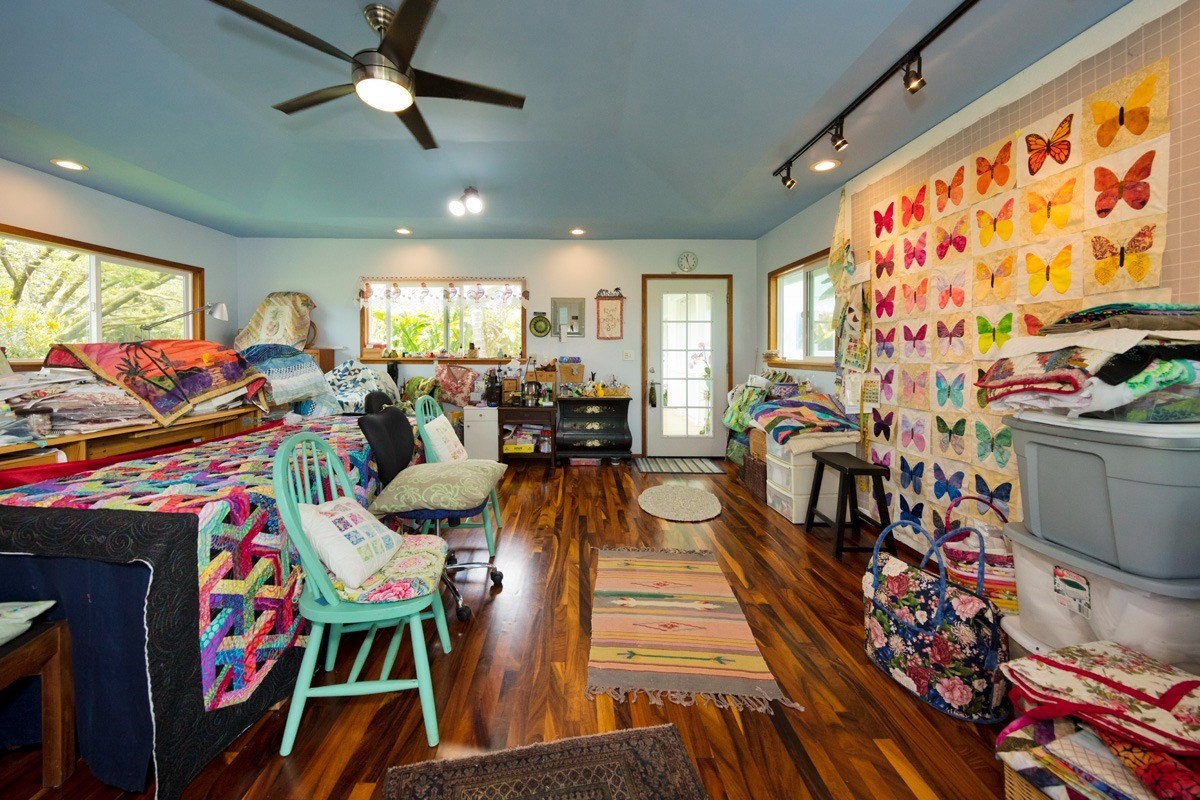 20 Hoaka Road Hilo, HI 96720 - Photo 15 of 30 a view of a dining room with furniture window and wooden floor