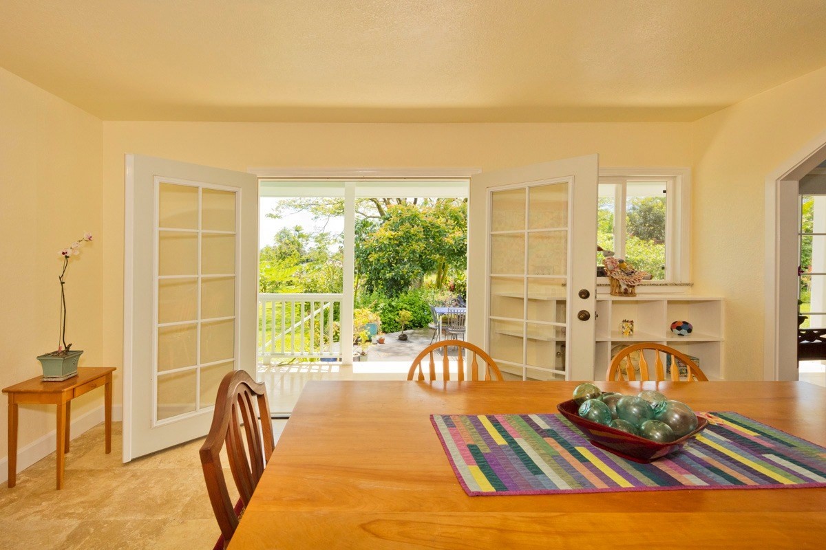 20 Hoaka Road Hilo, HI 96720 - Photo 4 of 30 a bedroom with furniture and a large window