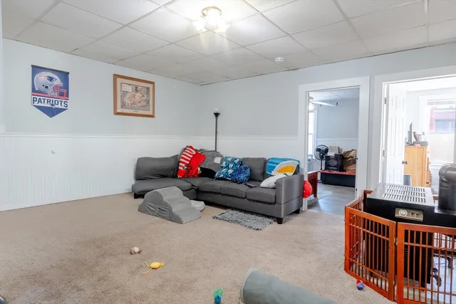 a kitchen with a sink cabinets and window