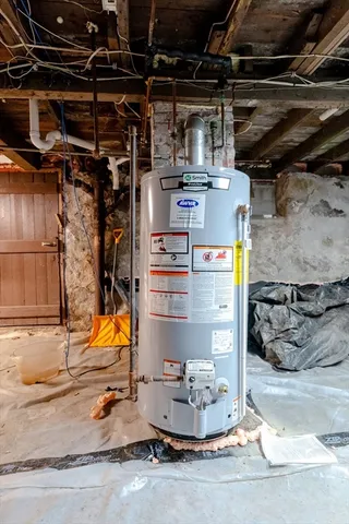 an aerial view of a houses with outdoor space