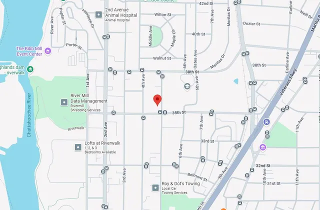 a white bath tub sitting next to a white door