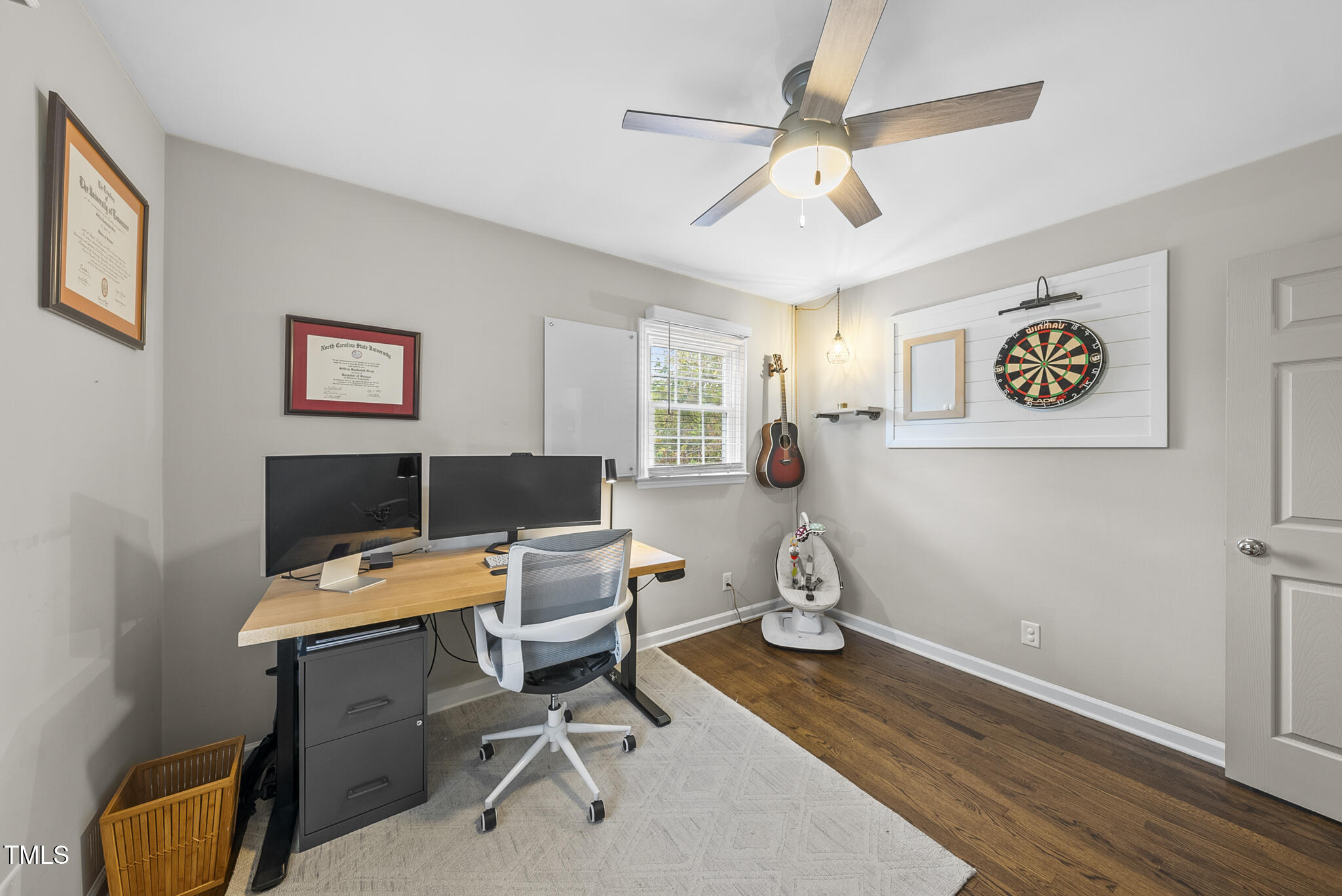 1533 North King Charles Road Raleigh, NC 27610 - Photo 32 of 41 a view of a workspace with furniture and a window