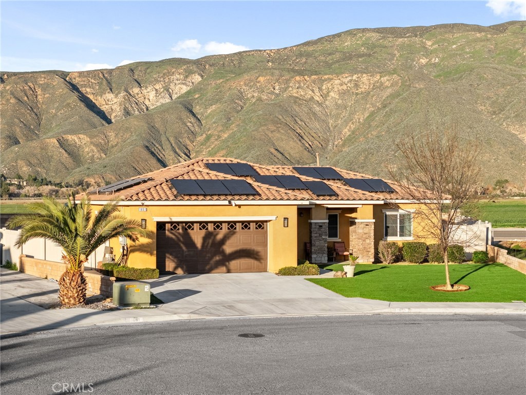 a view of a street with a building in the background