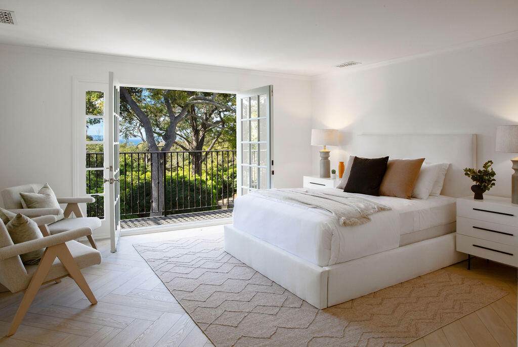 1839 East Mountain Drive Montecito, CA 93108 - Photo 15 of 24 a bedroom with a large bed and a view of living room