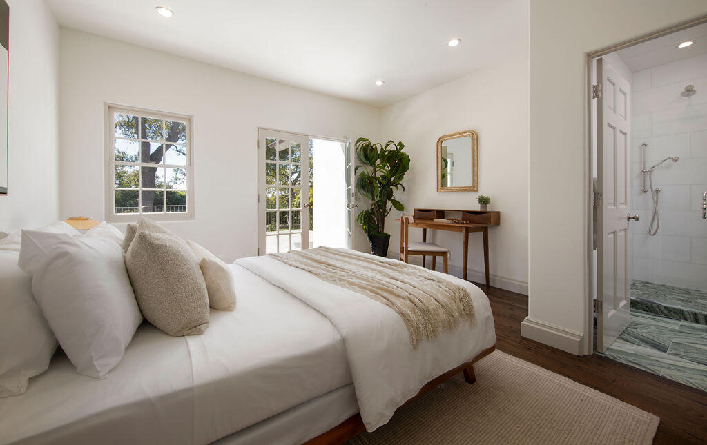 1839 East Mountain Drive Montecito, CA 93108 - Photo 18 of 24 a bedroom with a bed table and window